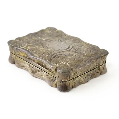 323 - A large Victorian silver vinaigrette with engraved acanthus scroll decoration, gilded interior and p... 
