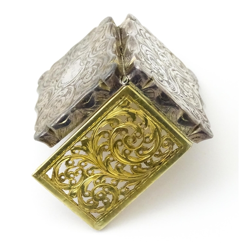 323 - A large Victorian silver vinaigrette with engraved acanthus scroll decoration, gilded interior and p... 