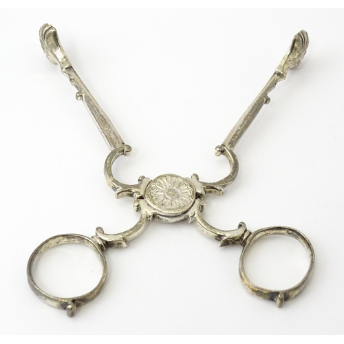 324 - 18thC Irish silver sugar nips. Together with silver plate sugar cutters with mother of pearl detail ... 