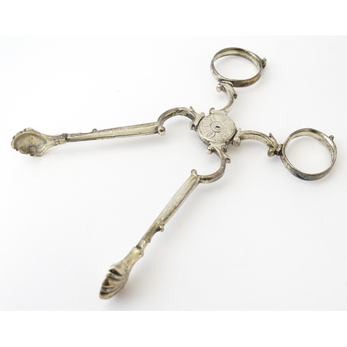 324 - 18thC Irish silver sugar nips. Together with silver plate sugar cutters with mother of pearl detail ... 