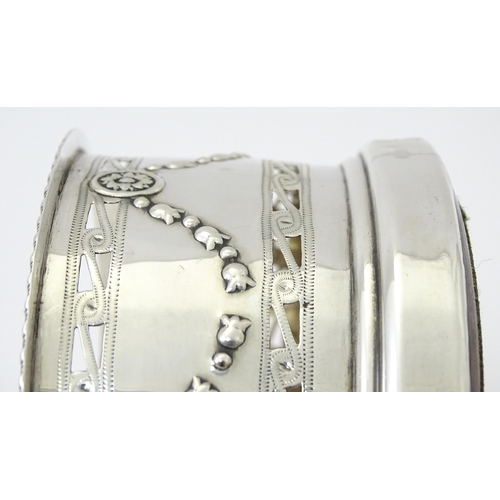 333 - A silver wine coaster with turned wooden base and swag detail, hallmarked Chester 1905, maker George... 