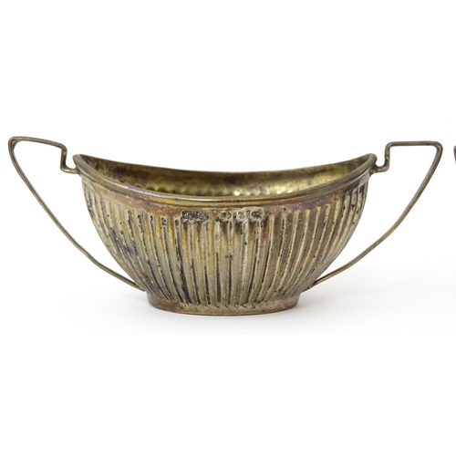 334 - A set of four Victorian silver twin handled salts with fluted detail hallmarked Birmingham 1899, mak... 