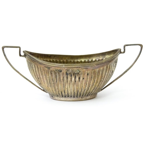 334 - A set of four Victorian silver twin handled salts with fluted detail hallmarked Birmingham 1899, mak... 