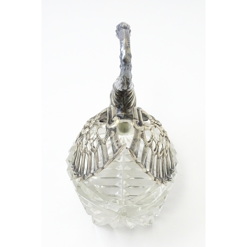 335 - A novelty glass table salt of swan form with silver detail. Approx. 4 1/2