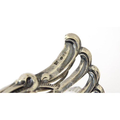 335 - A novelty glass table salt of swan form with silver detail. Approx. 4 1/2