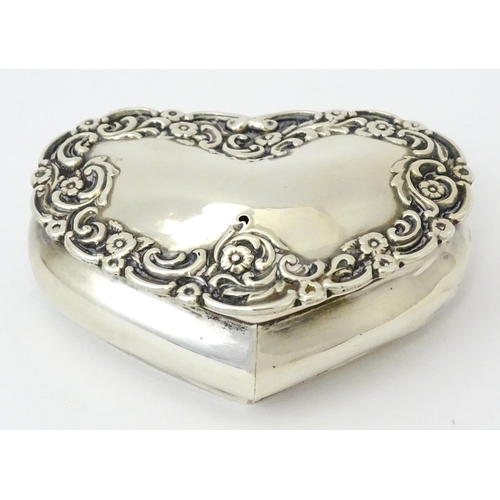 336 - A Victorian silver pot of heart form with embossed floral decoration, hallmarked Birmingham 1898, ma... 