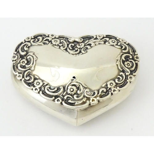 336 - A Victorian silver pot of heart form with embossed floral decoration, hallmarked Birmingham 1898, ma... 
