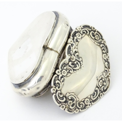 336 - A Victorian silver pot of heart form with embossed floral decoration, hallmarked Birmingham 1898, ma... 