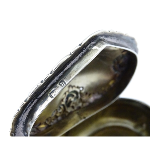 336 - A Victorian silver pot of heart form with embossed floral decoration, hallmarked Birmingham 1898, ma... 