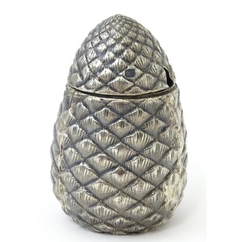 337 - A novelty silver mustard pot of pine cone form hallmarked Sheffield c. 1900, maker George Wish. Toge... 
