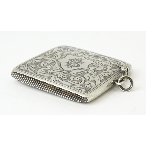 340 - A silver vesta case with engraved acanthus scroll decoration, hallmarked Chester 1910, maker Sydney ... 