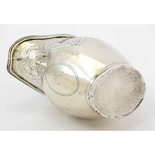 342 - A silver cream jug with engraved decoration, hallmarked London 1802, maker Peter, Ann & William Bate... 