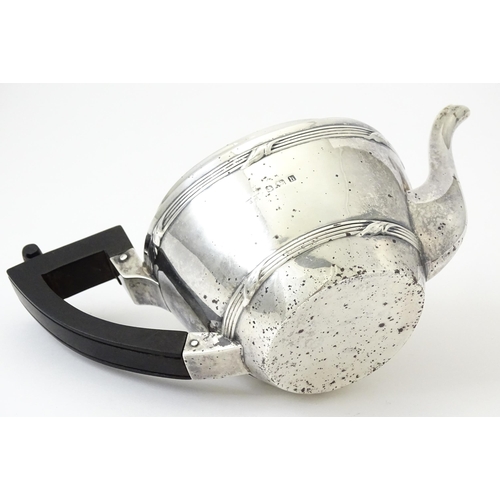 344 - A silver Bachelor's three piece tea set comprising teapot, sugar bowl and milk jug, hallmarked Birmi... 