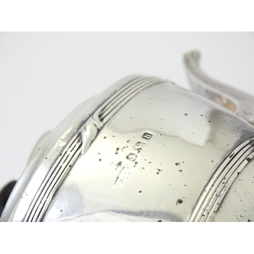 344 - A silver Bachelor's three piece tea set comprising teapot, sugar bowl and milk jug, hallmarked Birmi... 