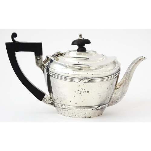 344 - A silver Bachelor's three piece tea set comprising teapot, sugar bowl and milk jug, hallmarked Birmi... 