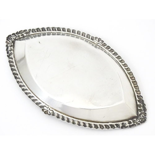 346 - A silver pin dish of lozenge form, hallmarked Birmingham 1973. Approx. 5 1/4