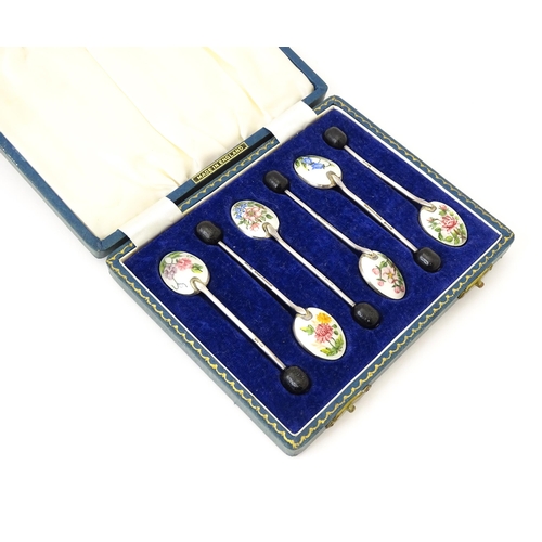 347 - A cased set of six silver coffee spoons with enamel and hand painted floral decoration, hallmarked B... 