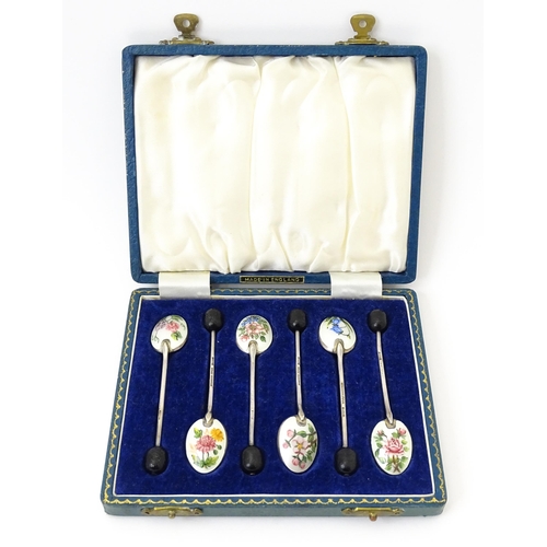 347 - A cased set of six silver coffee spoons with enamel and hand painted floral decoration, hallmarked B... 