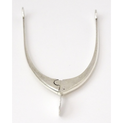 348 - Silver sugar tongs of wishbone form, hallmarked Birmingham 1931, maker James Swann & Son. Approx. 3
