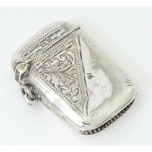 352 - A silver vesta case with engraved decoration, hallmarked Birmingham 1913, maker Thomas Hayes. Approx... 