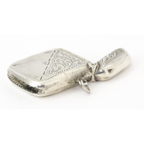 352 - A silver vesta case with engraved decoration, hallmarked Birmingham 1913, maker Thomas Hayes. Approx... 