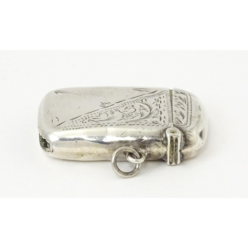 352 - A silver vesta case with engraved decoration, hallmarked Birmingham 1913, maker Thomas Hayes. Approx... 