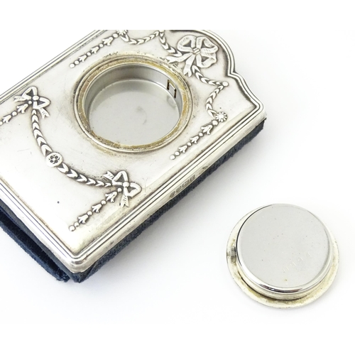 353 - An easel back clock with silver surround, hallmarked Sheffield 1995, maker Carrs of Sheffield. Appro... 