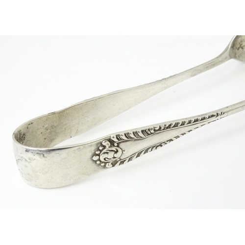 356 - Silver sugar tongs with engraved decoration, hallmarked Birmingham 1929, maker Joseph Gloster Ltd. A... 