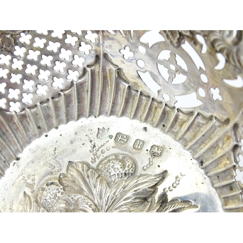358 - A silver bon bon dish with embossed and pierced decoration, hallmarked Birmingham 1894, maker George... 