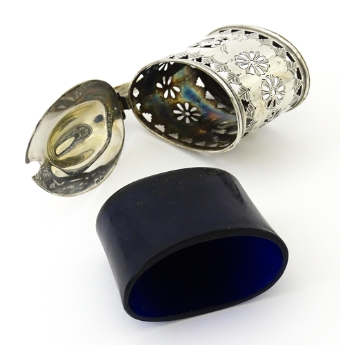 316 - A silver mustard pot with pierced decoration and blue glass liner, hallmarked Birmingham 1901. Toget... 