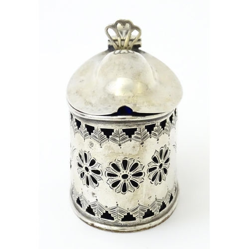 316 - A silver mustard pot with pierced decoration and blue glass liner, hallmarked Birmingham 1901. Toget... 