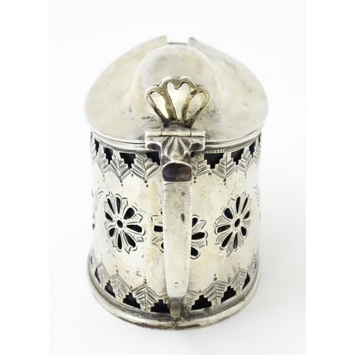 316 - A silver mustard pot with pierced decoration and blue glass liner, hallmarked Birmingham 1901. Toget... 