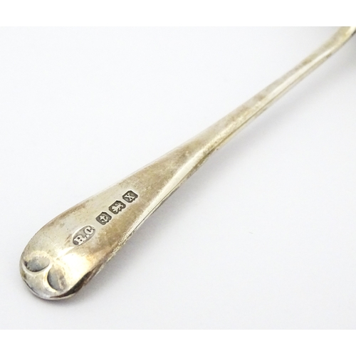 528 - A cased silver Christening set comprising egg cup, spoon and napkin ring, hallmarked Birmingham 1922... 