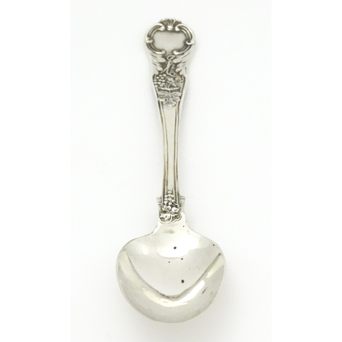 529 - A cased Victorian silver Christening spoon with fruiting vine decoration, hallmarked London 1879, ma... 