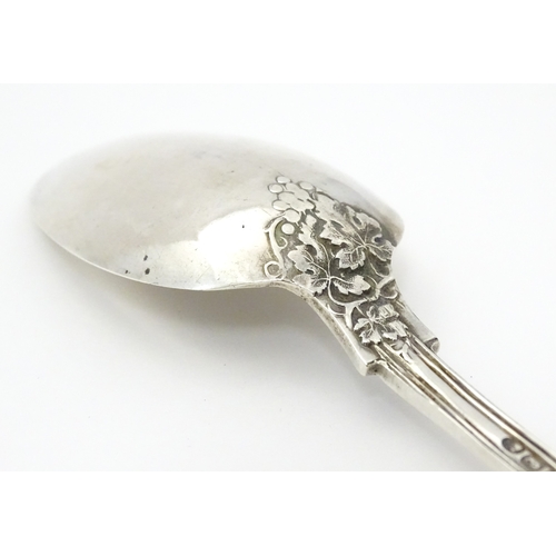 529 - A cased Victorian silver Christening spoon with fruiting vine decoration, hallmarked London 1879, ma... 