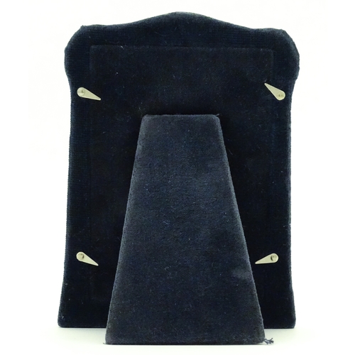 535 - An easel back photograph frame with silver surround, hallmarked Sheffield 1997, make Carrs of Sheffi... 