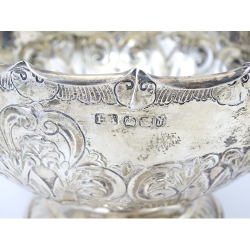 543 - A Victorian silver pedestal bowl with embossed decoration, hallmarked Sheffield 1896, maker Atkin Br... 