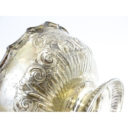 543 - A Victorian silver pedestal bowl with embossed decoration, hallmarked Sheffield 1896, maker Atkin Br... 
