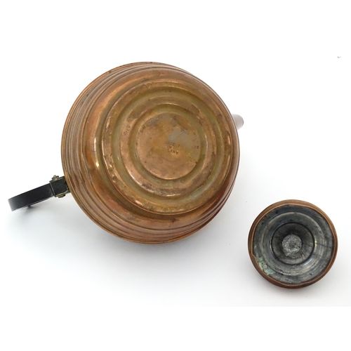 3 - A quantity of brass and copper to include a copper kettle, teapot and jug together with a large bras... 