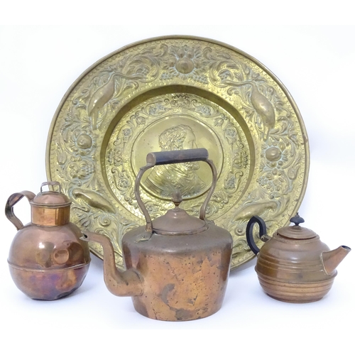 3 - A quantity of brass and copper to include a copper kettle, teapot and jug together with a large bras... 