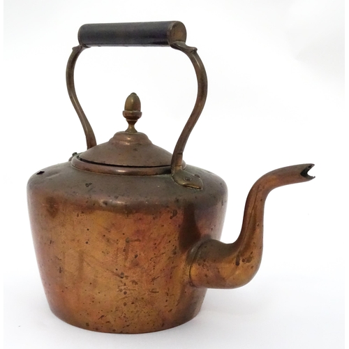 3 - A quantity of brass and copper to include a copper kettle, teapot and jug together with a large bras... 