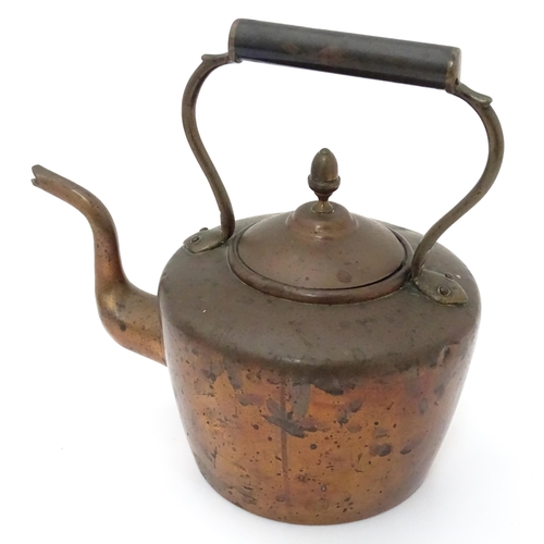 3 - A quantity of brass and copper to include a copper kettle, teapot and jug together with a large bras... 