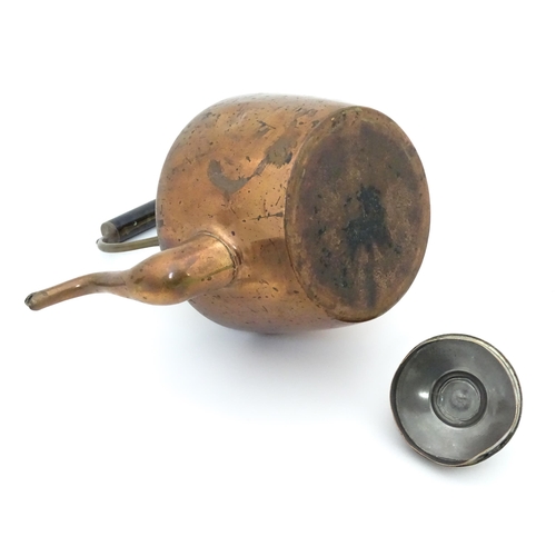 3 - A quantity of brass and copper to include a copper kettle, teapot and jug together with a large bras... 