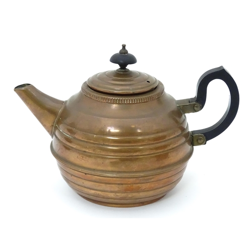 3 - A quantity of brass and copper to include a copper kettle, teapot and jug together with a large bras... 