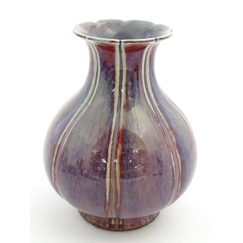 62 - A Chinese sang de boeuf vase of lobed form. Approx. 10 1/2