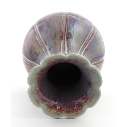 62 - A Chinese sang de boeuf vase of lobed form. Approx. 10 1/2