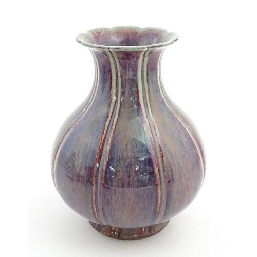 62 - A Chinese sang de boeuf vase of lobed form. Approx. 10 1/2