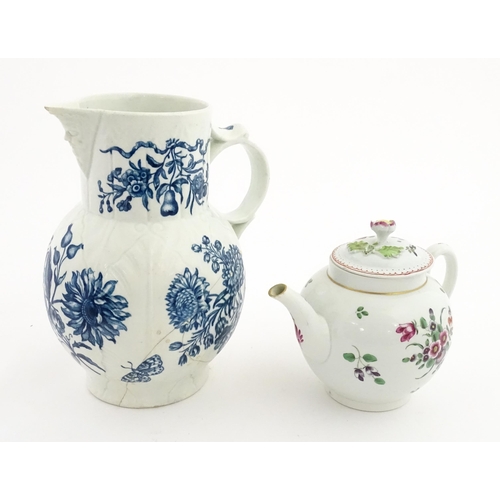 88 - A large 18thC Worcester blue and white sparrow beak jug decorated with flowers and butterflies. Toge... 