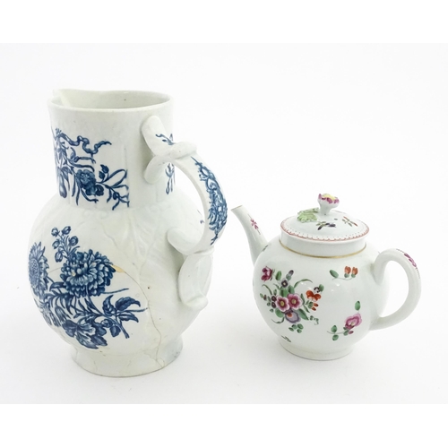 88 - A large 18thC Worcester blue and white sparrow beak jug decorated with flowers and butterflies. Toge... 