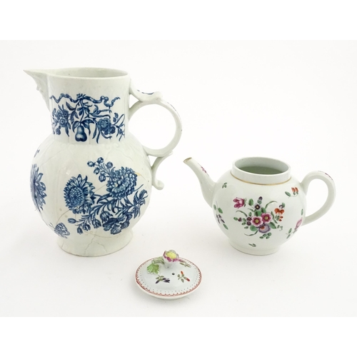 88 - A large 18thC Worcester blue and white sparrow beak jug decorated with flowers and butterflies. Toge... 